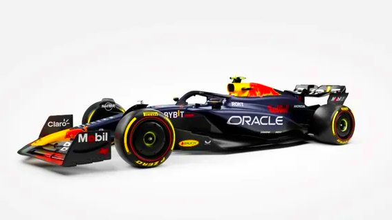 A race car with a white background Description automatically generated 1
